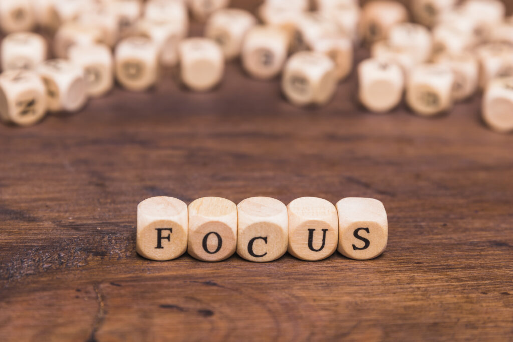 wooden letters that spell out focus