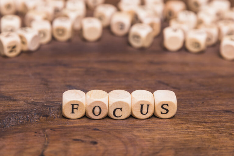 wooden letters that spell out focus