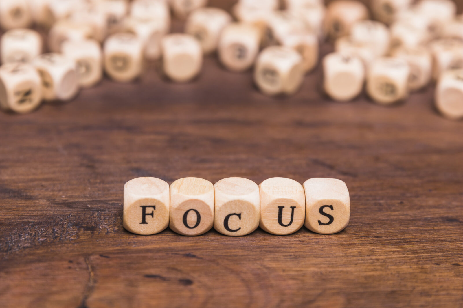 wooden letters that spell out focus